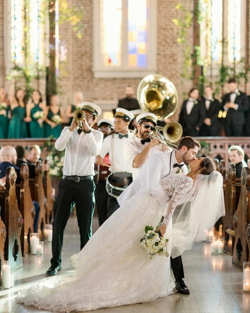 The 10 Best Wedding Venues in New Orleans, wedding ceremony, wedding reception, wedding venue owner, second line band, locally owned wedding venue, wedding venue education, wedding venue consulting, wedding venue coach, bride, groom, second line, wedding exit, luxury wedding