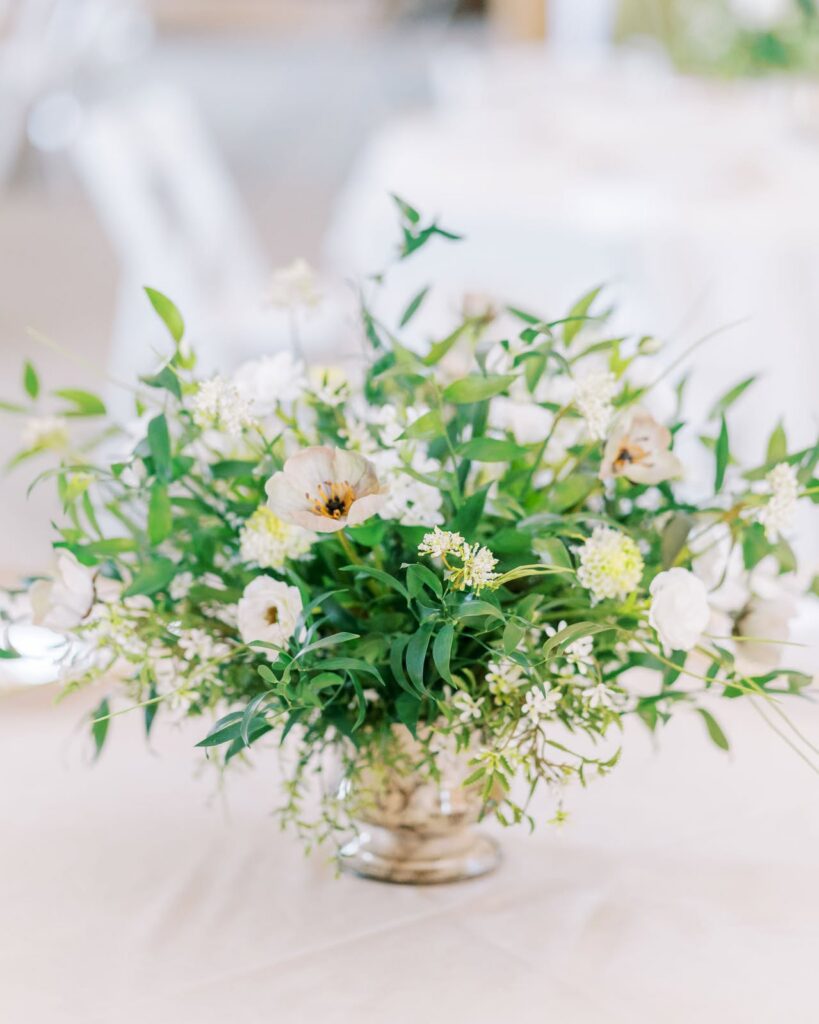 Elegant wedding table décor and floral arrangements at The Barn at Drewia Hill, a countryside chic wedding venue near Chattanooga.
