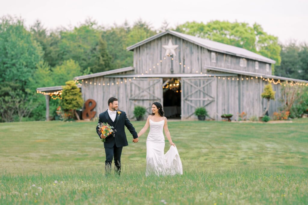 Bride and groom celebrating their wedding day at The Barn at Drewia Hill near Chattanooga Tennessee