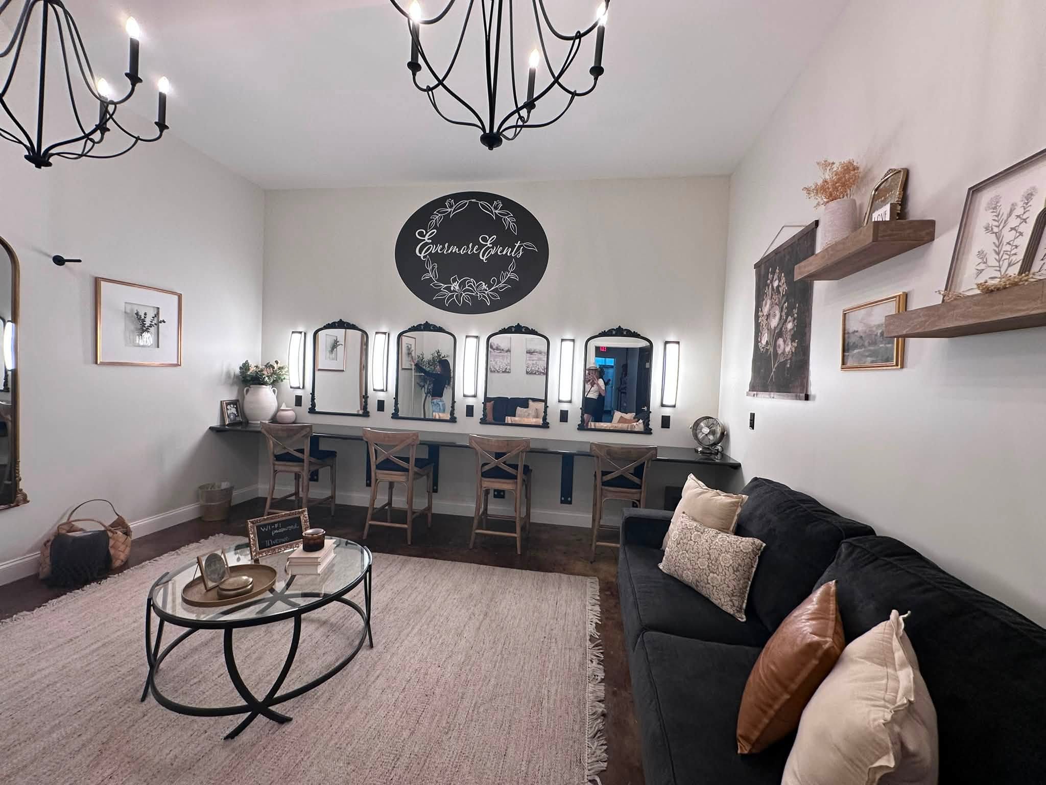 Wedding dressing room at a Lancaster PA wedding venue with elegant decor make up stations cozy seating and quality lighting