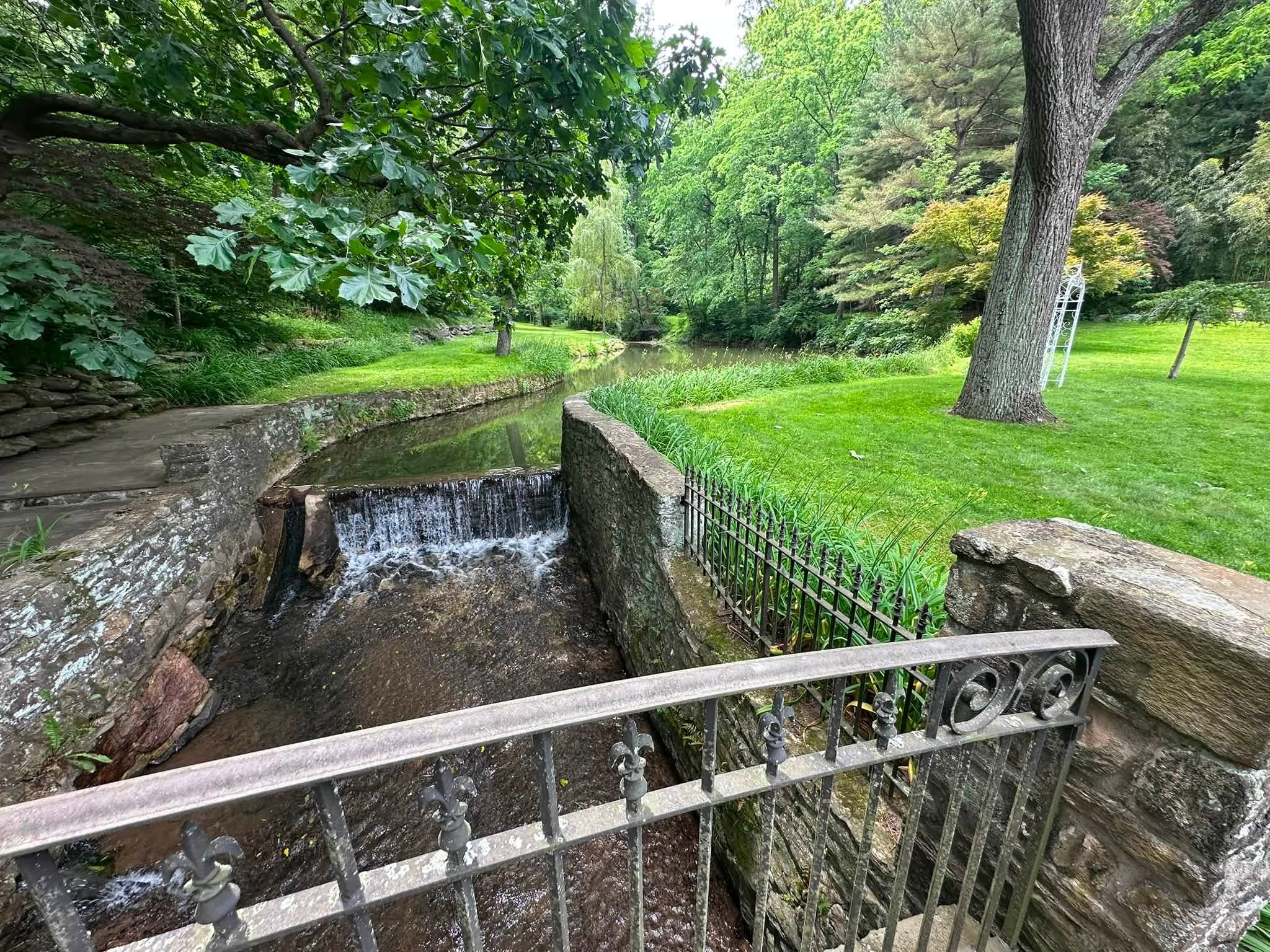 French Country Manor Estate Lancaster Pennsylvania beautiful garden weddings by a river and romantic bridge