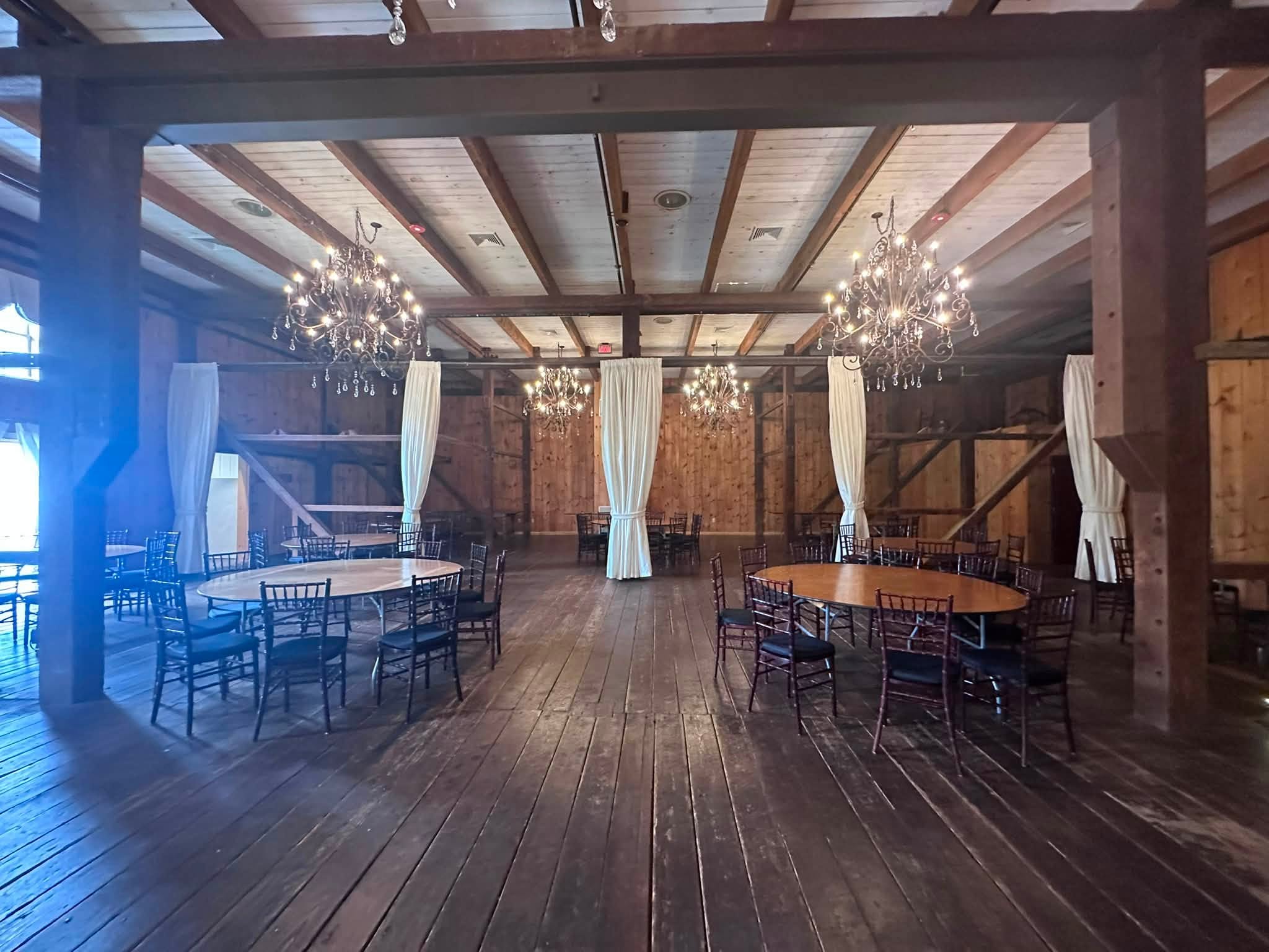 Melhorn Manor is a charming wedding venue featuring a stone manor rustic barns and sprawling grounds