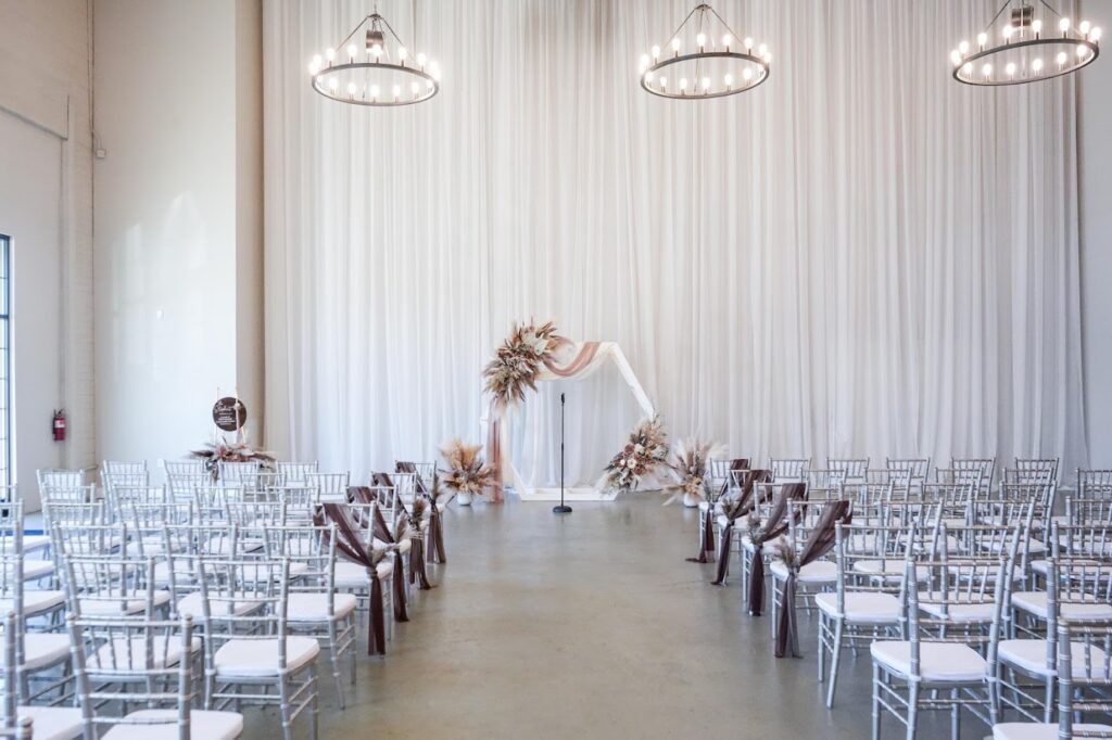Elegant indoor wedding ceremony at The Event at Two Ten, a wedding venue near Winston-Salem NC