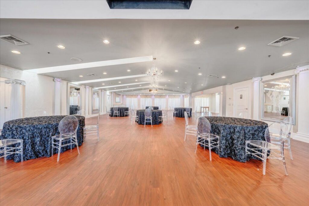 Indoor ballroom reception space inside a Virginia wedding venue property for sale offering more than 10,000 square feet of total building space.
Do you like this personality?