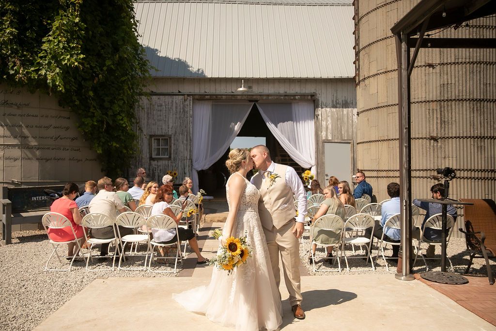 Outdoor wedding ceremony at Irish Hills Wedding Barn near Ann Arbor, Michigan