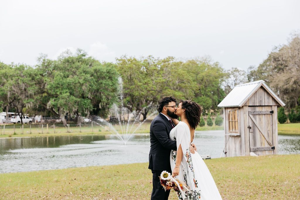 Rustic Grace Barn wedding venue in Davenport Florida near Orlando offering waterfront views, all inclusive packages, garden wedding ceremony and indoor receptions. 